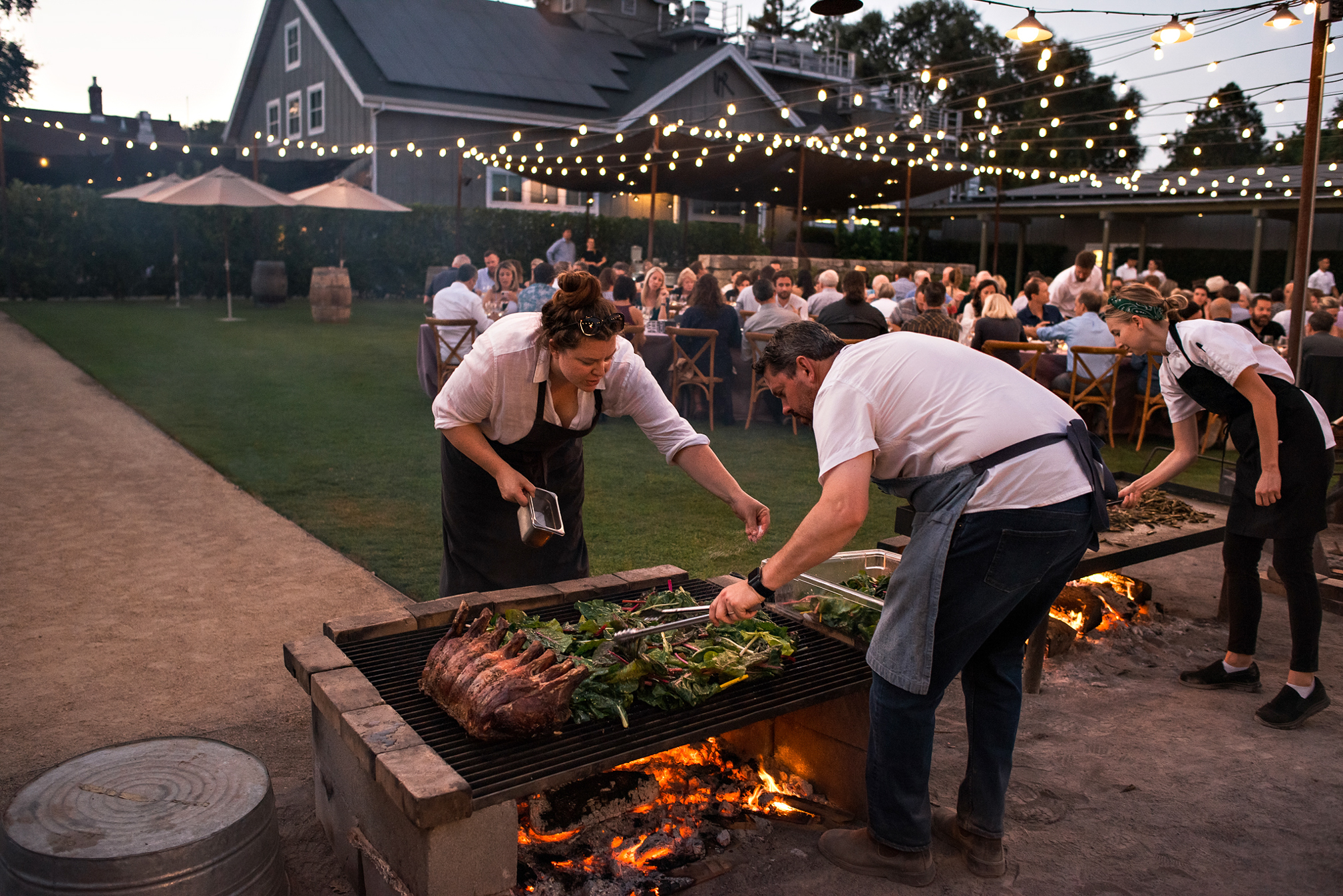 Cooking food at the Farmstead Live Fire event