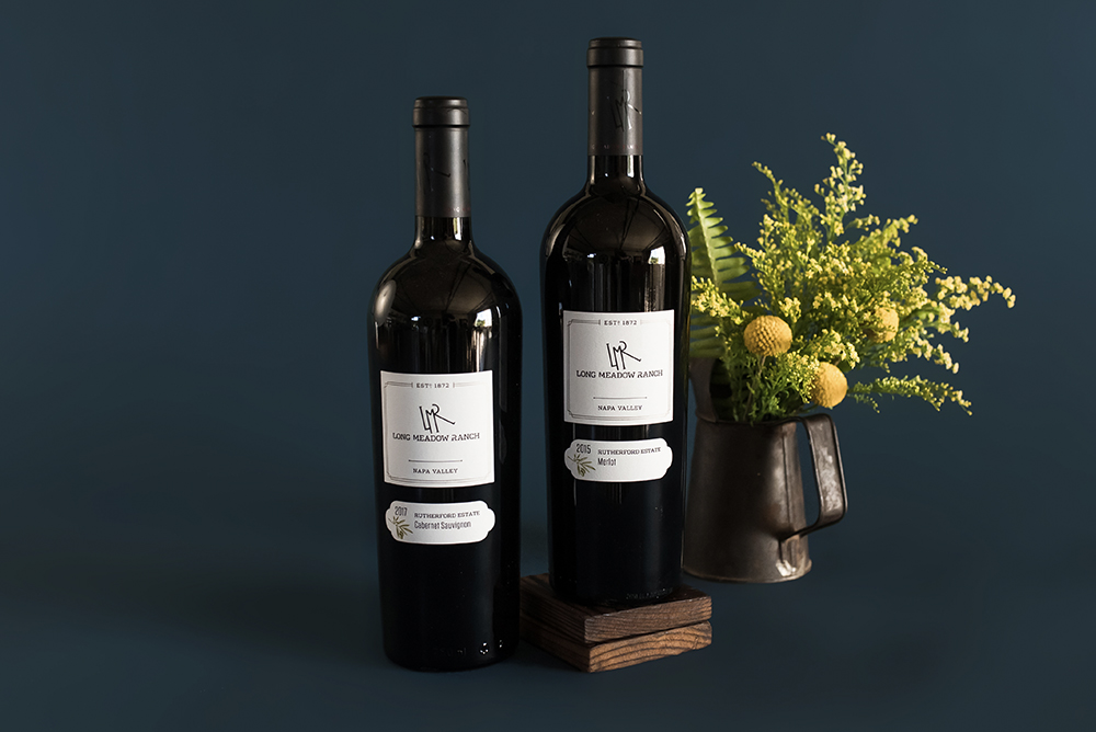 Bottles of Long Meadow Ranch Cabernet Sauvignon and Merlot